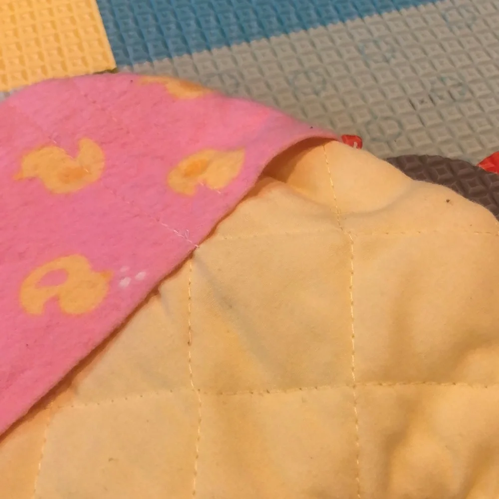 3/$12 Quilted Bib with Duck-Detail Pocket (OS)